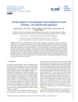 On the impact of non-Gaussian wind statistics on wind turbines – an experimental approach