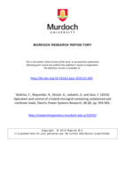 Operation and control of a hybrid microgrid containing unbalanced and nonlinear loads
