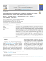 Integrating bioelectrochemical system with aerobic bioreactor for organics removal and caustic recovery from alkaline saline wastewater